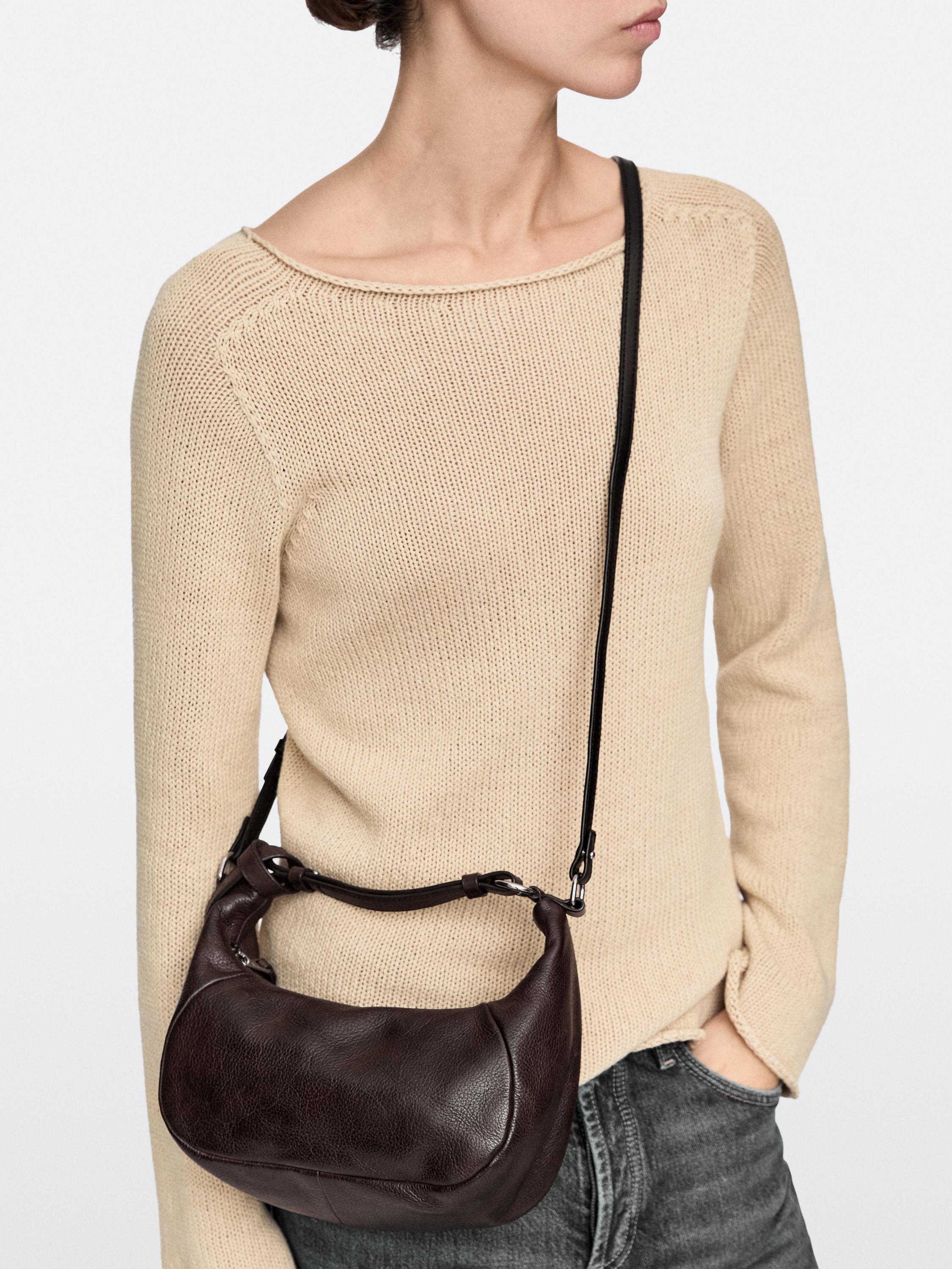 Nappa leather bag with metal buckle